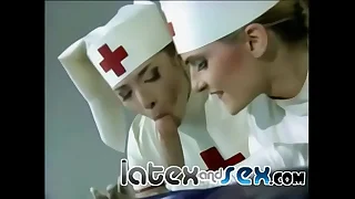 Latex nurses treat a rubber gas mask guy